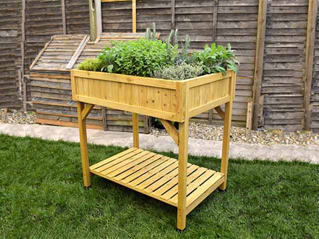 Hi, is the bottom shelf strong enough to hold more herbs in pots?